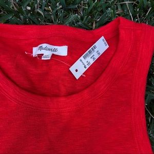 Red sleeveless shirt